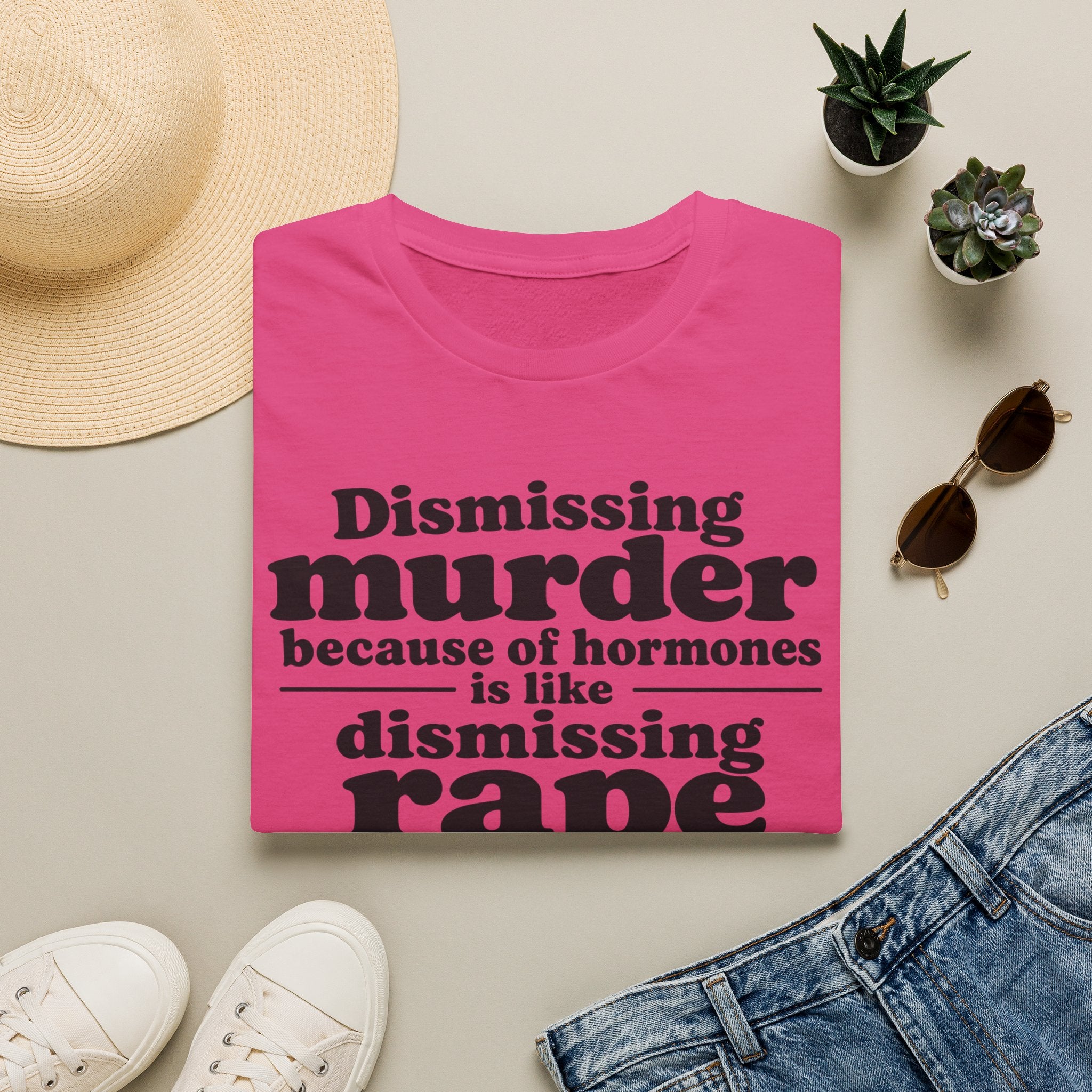 Statement Tee — "Dismissing m because of hormones is like dismissing r because of testosterone"