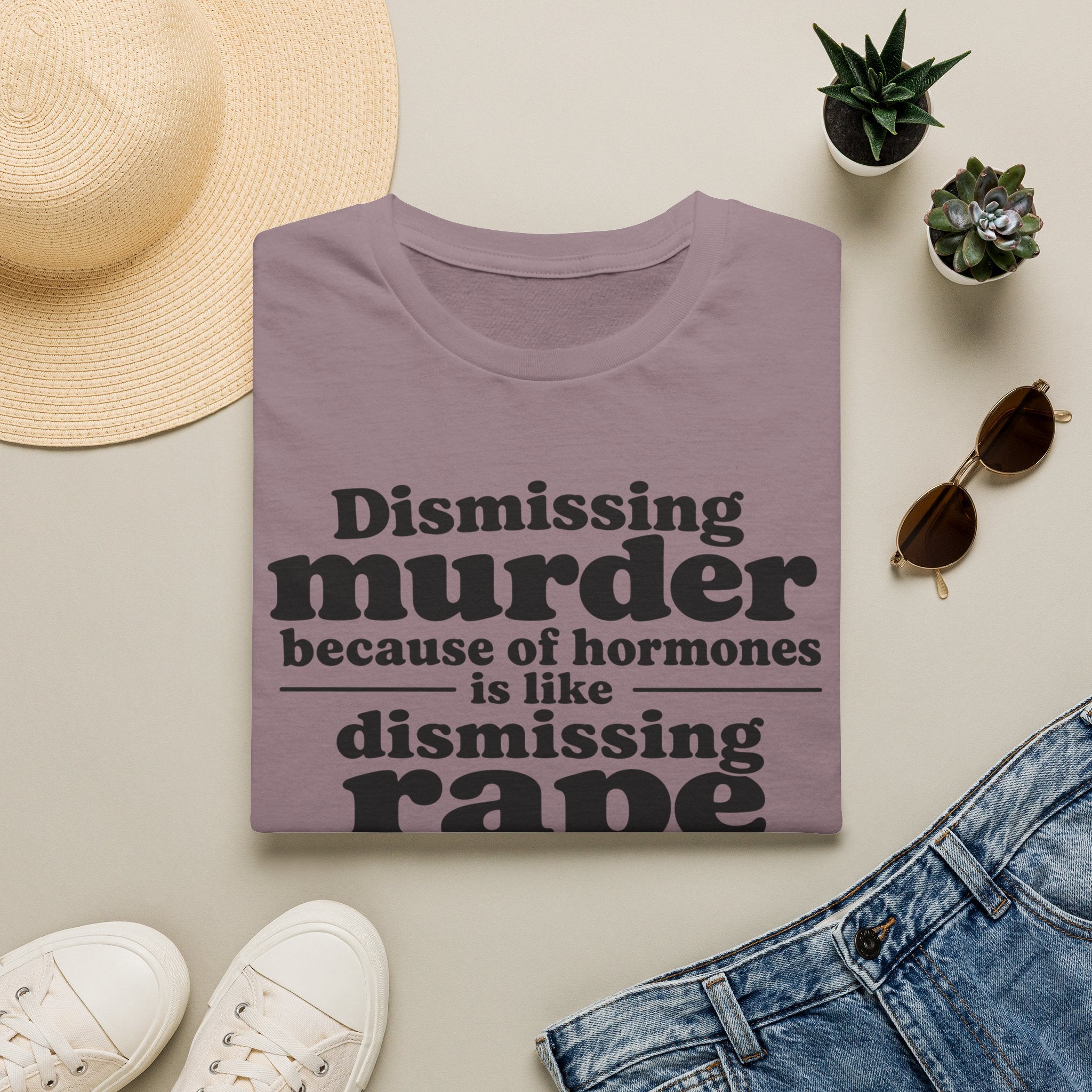 Statement Tee — "Dismissing m because of hormones is like dismissing r because of testosterone"