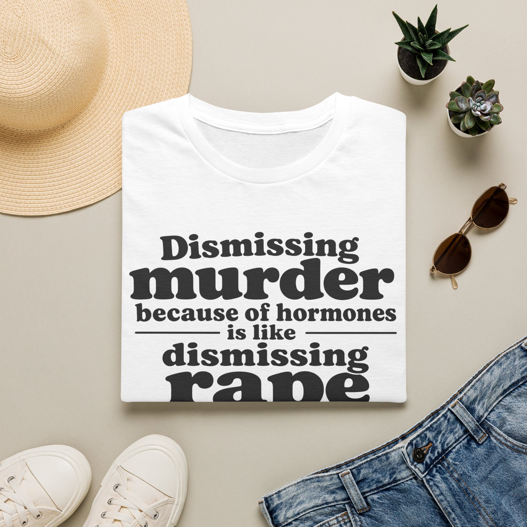 Statement Tee — "Dismissing m because of hormones is like dismissing r because of testosterone"