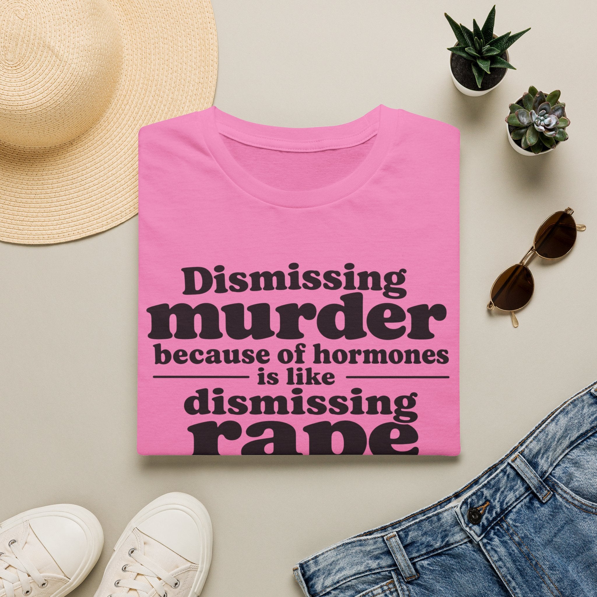 Statement Tee — "Dismissing m because of hormones is like dismissing r because of testosterone"